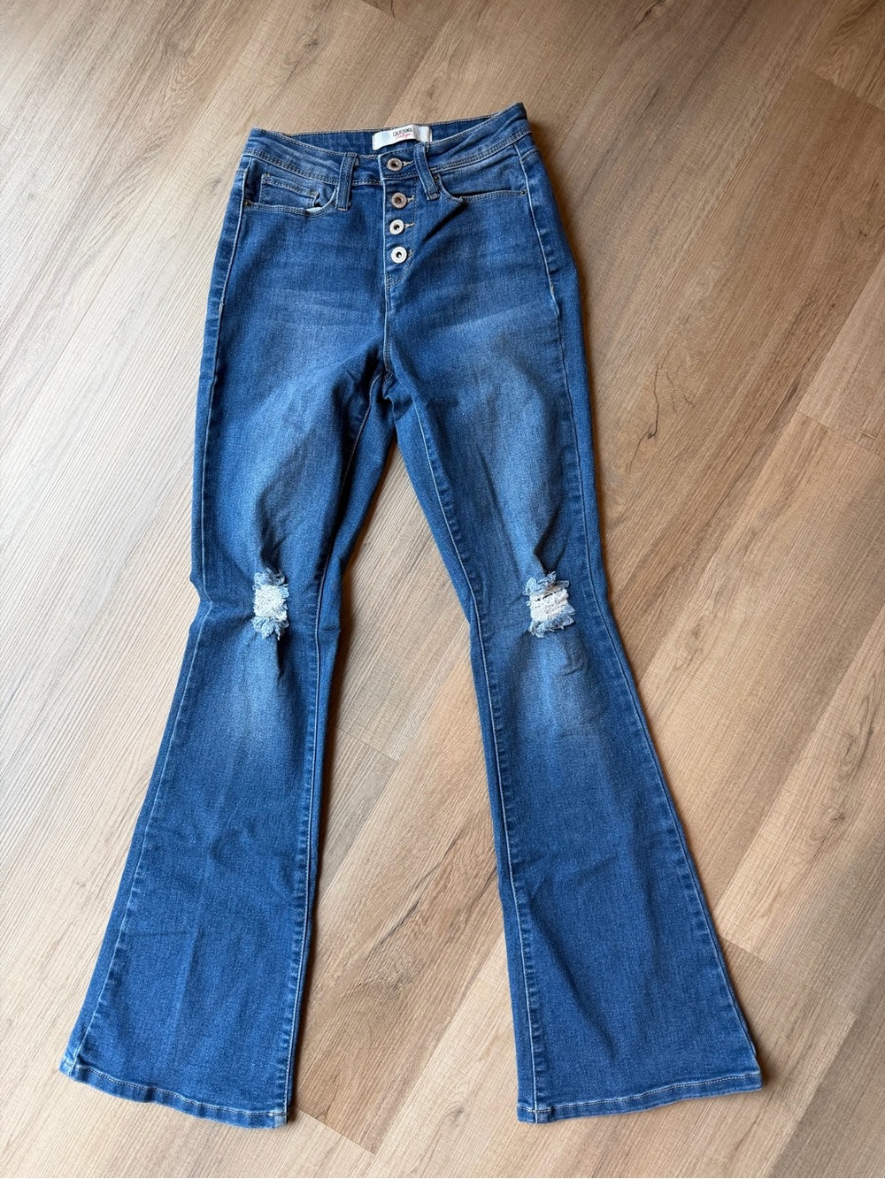 California Vintage High-Rise Med Blue Flare Jeans with Knee Rips